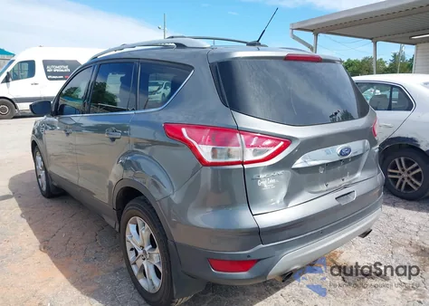 2014 Ford Escape Titanium z USA, uszkodzony, nr VIN 1FMCU9J95EUD30151